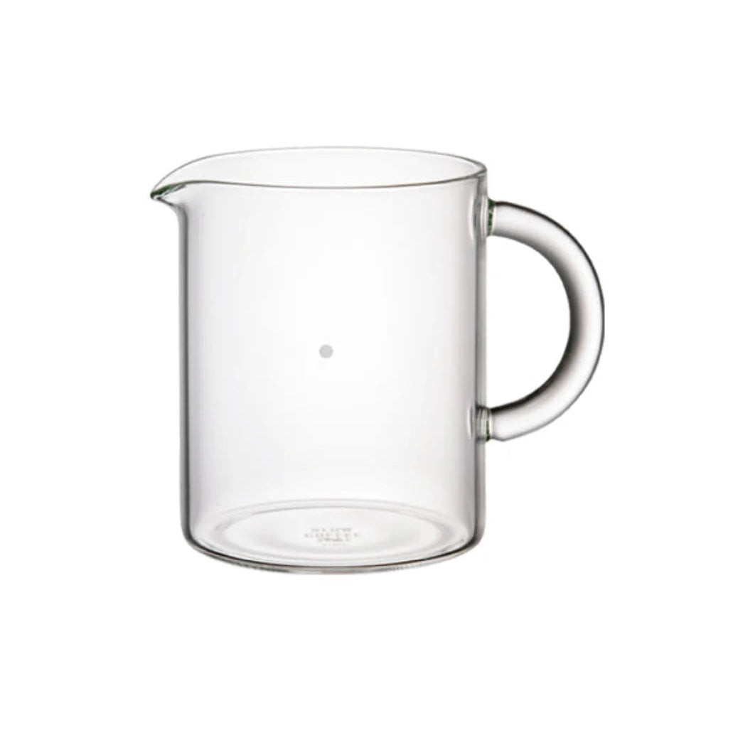 A clear glass measuring pitcher with a pouring spout and a curved handle, shown on a plain white background.