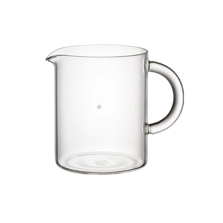 A clear glass measuring pitcher with a pouring spout and a curved handle, shown on a plain white background.